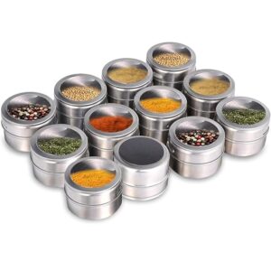Close up of magnetic spice tin showing red chili powder and clear lid
