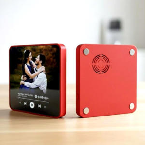 Custom Music Player Fridge Magnet showing a couple's photo and red magnetic back