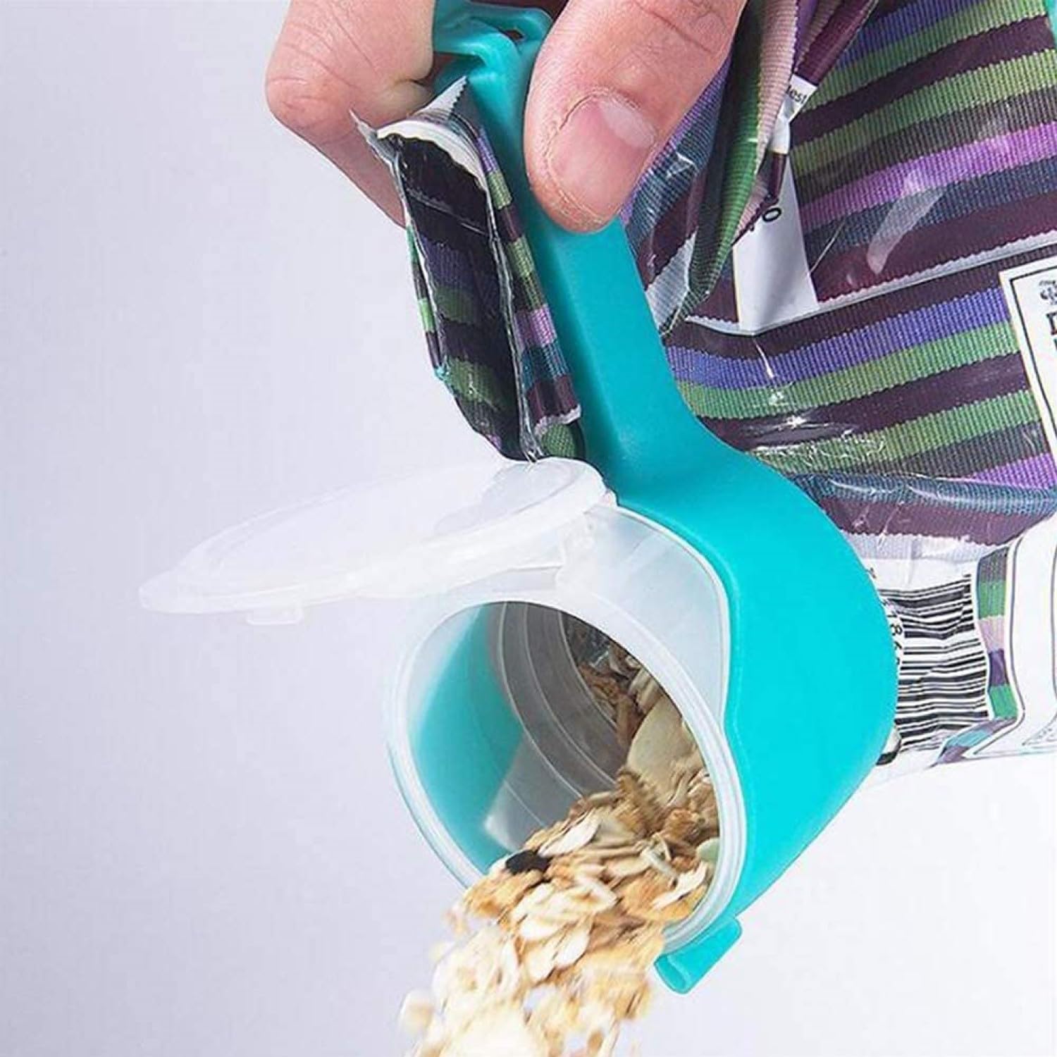 The wide, circular spout allows you to easily pour oats, dal, or snacks without taking the clip off!